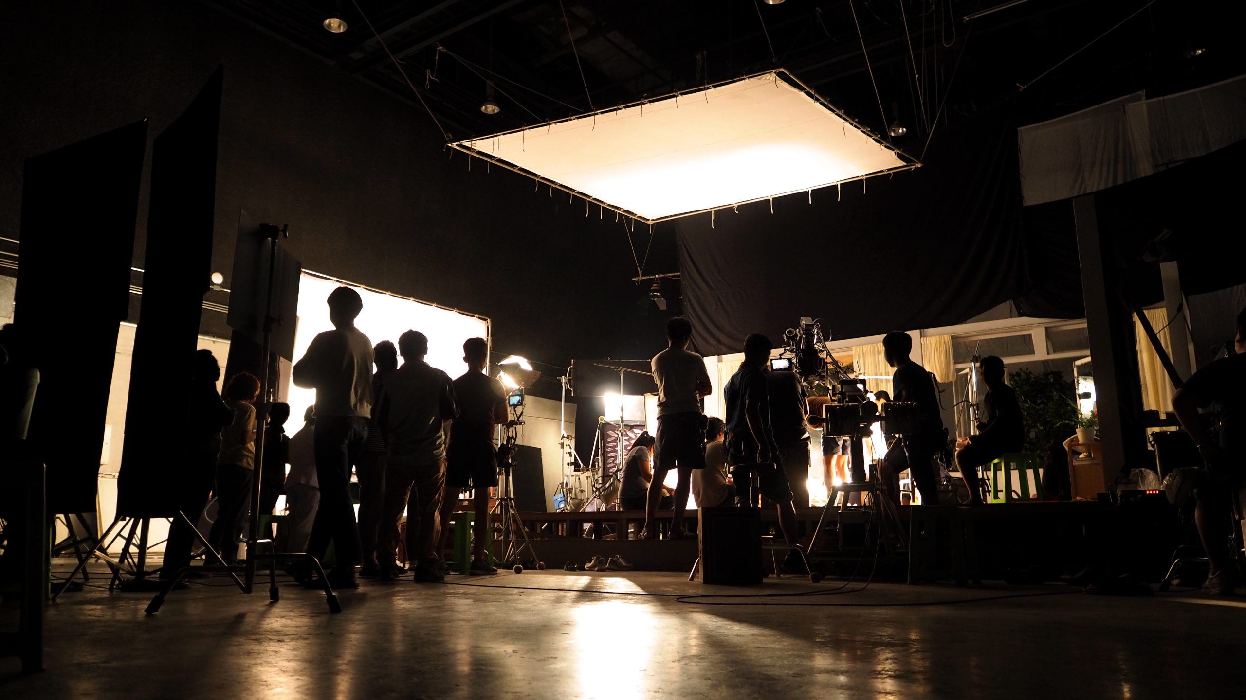 Behind the scenes of video production team silhouette